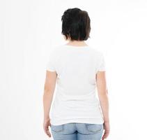 back view brunette woman in tshirt on white background. Mock up for design. Copy space. Template. Blank photo