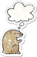 cartoon bear and thought bubble as a distressed worn sticker vector