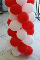 Balloons in a city park on the seashore. photo