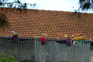 Karmiel Israel December 4, 2019. Red tiled roof on a residential building. photo