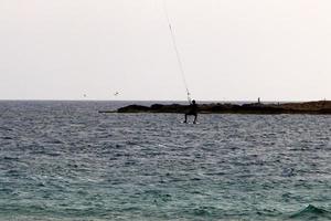 Nahariya Israel June 16, 2020. Man on vacation in a city park near the sea. photo