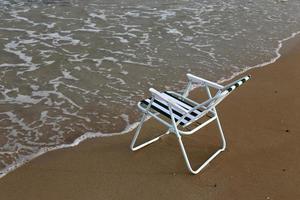 Chair for relaxing in a cafe on the Mediterranean coast photo