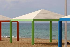 Jerusalem Israel June 17, 2021 Canopy from the scorching sun on the seashore. photo