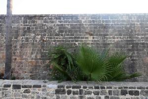 Nahariya Israel September 24, 2019. High wall made of stone and concrete. photo