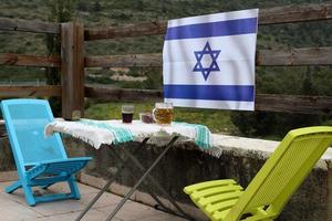 The blue and white Israeli flag with the Star of David. photo