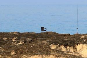 Chair for relaxing in a cafe on the Mediterranean coast photo