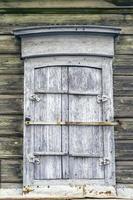 Background with old wooden window with shutters photo