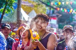 Siam Square, Bangkok, Thailand - APR 13, 2019 short action of people joins celebrations of the Thai New Year or Songkran in Siam Square. photo