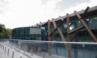 Congress and exhibition center Parkovy with a helipad. Business center in Kyiv. Modern building. Helicopter Maydanchik of Yanukovych. Ukraine, Kyiv - June 9, 2022. photo