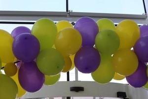 Balloons in a city park on the seashore. photo