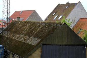 Leaky roof on an old village house. photo