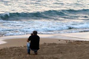 Nahariya Israel June 16, 2020. Man on vacation in a city park near the sea. photo