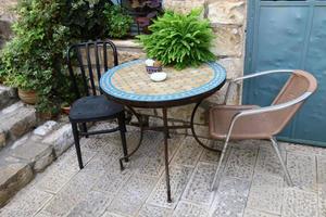 Chair for relaxing in a cafe on the Mediterranean coast photo