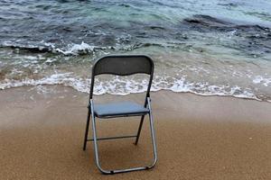 Chair for relaxing in a cafe on the Mediterranean coast photo