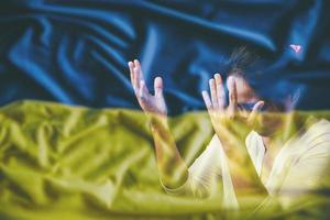 Pray for Ukraine, flag Ukraine. Russia vs Ukraine stop war. Pray Ukraine, eucharist therapy bless god helping, belief, forgiveness, freedom, hope and faith, christian religion concept photo