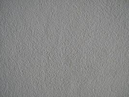 Dark grunge textured wall closeup.Old black background. photo