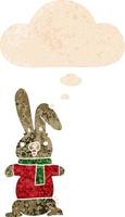 cartoon rabbit and thought bubble in retro textured style vector