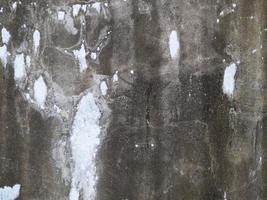 colored cement cracked concrete surface, texture of rough. photo
