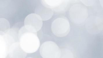 The illuminated white bokeh image can be used as a background illustration or add text. photo