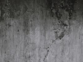 Black and white background image, rough surface, looks like a cement floor. photo