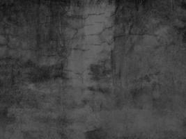 The old cement wall was weathered, the surface was scratched, the surface was scratched and damaged. For a mysterious retro-conservative background. photo