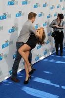 LOS ANGELES, MAY 12 - Derek Hough, Maria Menounos arrives at the Wango Tango Concert at The Home Depot Center on May 12, 2012 in Carson, CA photo