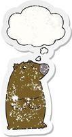 cartoon bear and thought bubble as a distressed worn sticker vector