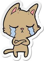 sticker of a crying cartoon cat with folded arms vector