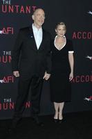 LOS ANGELES, OCT 10 - J K Simmons, Wife at the The Accountant World Premiere at TCL Chinese Theater IMAX on October 10, 2016 in Los Angeles, CA photo