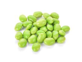 Green soybeans on white background photo