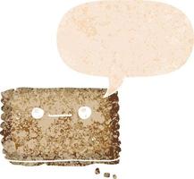 cartoon biscuit and speech bubble in retro textured style vector