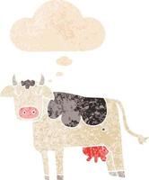 cartoon cow and thought bubble in retro textured style vector