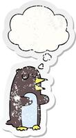 cartoon penguin and thought bubble as a distressed worn sticker vector