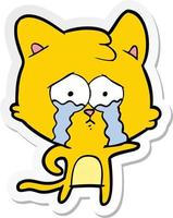 sticker of a cartoon crying cat vector