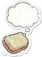 cartoon biscuit and thought bubble as a distressed worn sticker vector