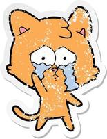 distressed sticker of a cartoon crying cat vector