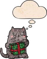 gato de navidad de dibujos animados y burbuja de pensamiento en estilo de patrón de textura grunge vector