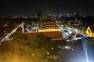 Beautiful night Cityscape view from Golden mountain in Wat saket Temple and Light of loi krathong Festival,Bangkok city Thailand photo