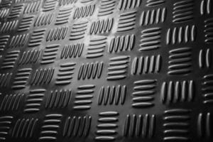 Texture of Stainless Tread Plate for background ,selective focus photo