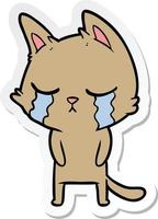 sticker of a crying cartoon cat vector