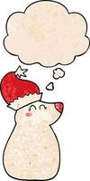 cartoon bear wearing christmas hat and thought bubble in grunge texture pattern style