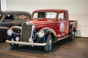 FRIEDRICHSHAFEN - MAY 2019 red black MERCEDES-BENZ 220 W187 1952 pickup at Motorworld Classics Bodensee on May 11, 2019 in Friedrichshafen, Germany photo