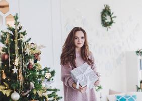 woman with Christmas gift photo