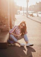 emotional hipster girl in urban style photo