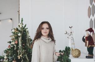 attractive woman in sweater photo