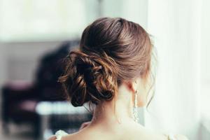 bride with wedding makeup and hairstyle. photo