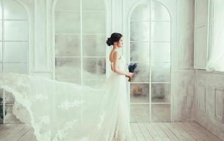 bride with flying dress photo