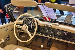 FRIEDRICHSHAFEN - MAY 2019 beige interior of MERCEDES-BENZ 190 SL 1961 cabrio roadster at Motorworld Classics Bodensee on May 11, 2019 in Friedrichshafen, Germany photo