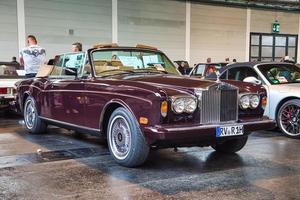 FRIEDRICHSHAFEN - MAY 2019 maroon ROLLS-ROYCE CORNICHE 2 II 1986 cabrio at Motorworld Classics Bodensee on May 11, 2019 in Friedrichshafen, Germany photo