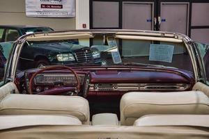 FRIEDRICHSHAFEN - MAY 2019 leather white red interior of CHRYSLER IMPERIAL CROWN 1963 cabrio at Motorworld Classics Bodensee on May 11, 2019 in Friedrichshafen, Germany photo